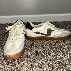 Stylish White and Black Sneakers